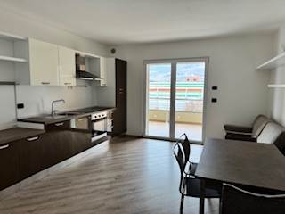 Trento sud, due stanze con garage.